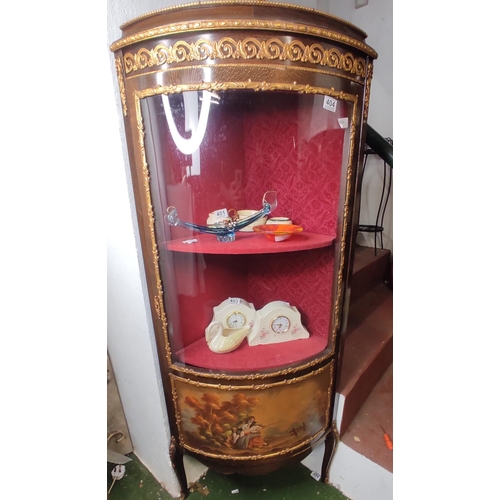 401 - A stunning antique style corner display cabinet with curved glass door.