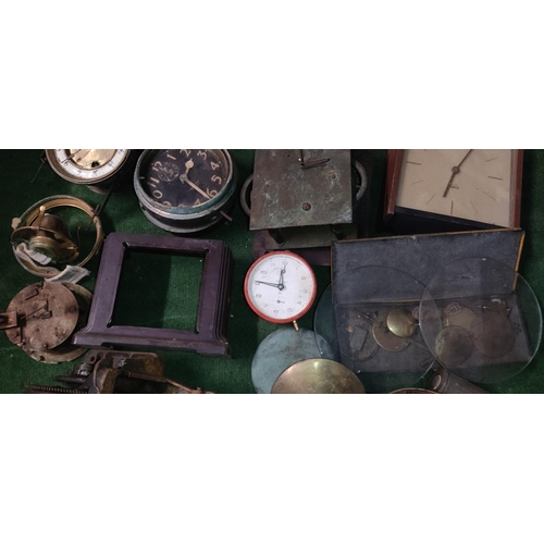 407 - A large assortment of vintage/ antique clock parts.