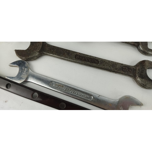 412 - An assortment of various tools to include Record adjustable wrench & more.