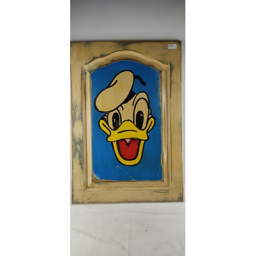 426 - A hand painted Donald Duck panel.