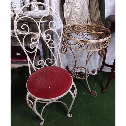 432 - A vintage/ Mid Century wrought iron table & chair (table in need of new glass top)