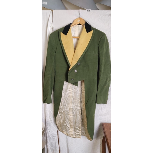 434 - A stunning antique/ Victorian green tailcoat.