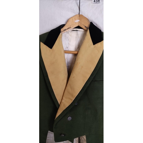 434 - A stunning antique/ Victorian green tailcoat.