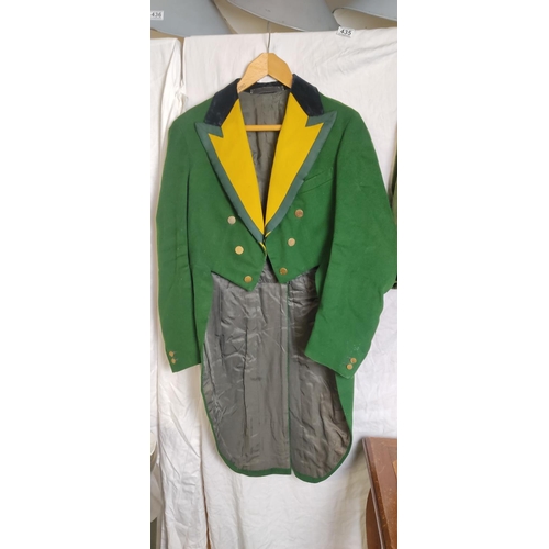 435 - A stunning antique/ Victorian green tailcoat.