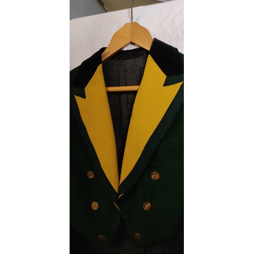 435 - A stunning antique/ Victorian green tailcoat.