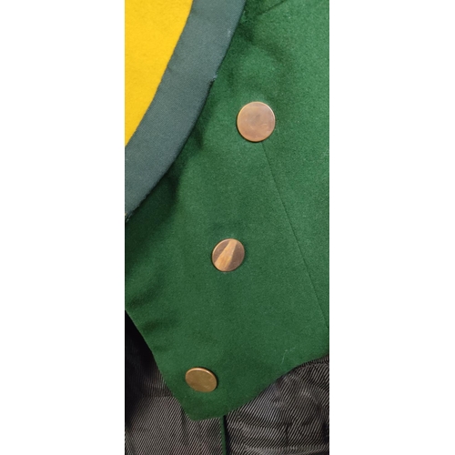 435 - A stunning antique/ Victorian green tailcoat.