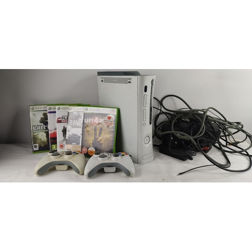 440 - An Xbox 360 & assortment of games (untested)