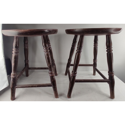 461 - A pair of vintage wooden pub stools.