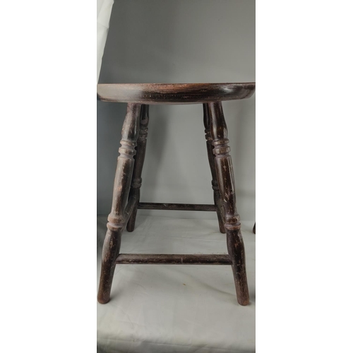 461 - A pair of vintage wooden pub stools.