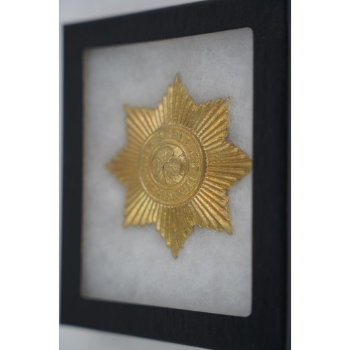 350 - A large metal Irish Guards badge.