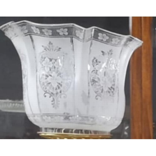 157 - An antique Corinthian clear glass font oil lamp with etched glass shade.