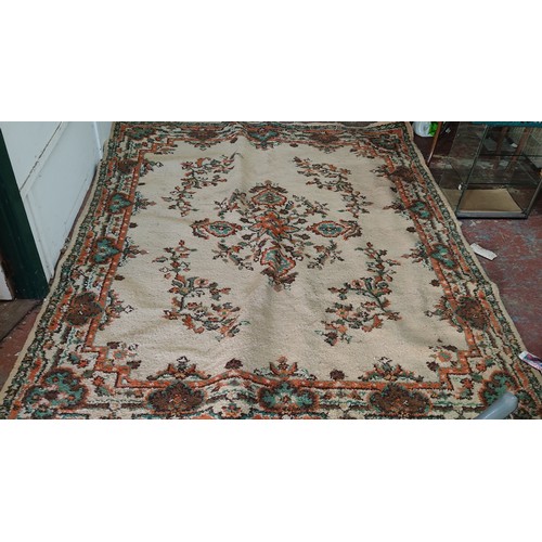 424 - A large decorative rug.