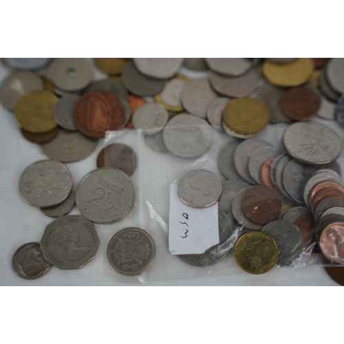 107 - An assorted lot of coinage, weighing approximately 1kg.