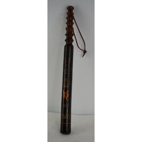 109 - An antique Victorian police truncheon, dated 1862.