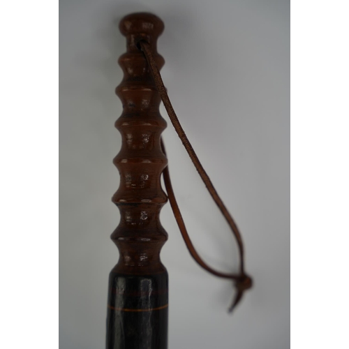 109 - An antique Victorian police truncheon, dated 1862.