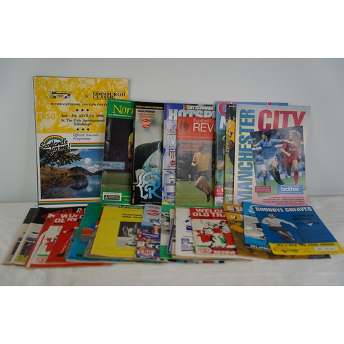 11 - A collection of various football programmes.