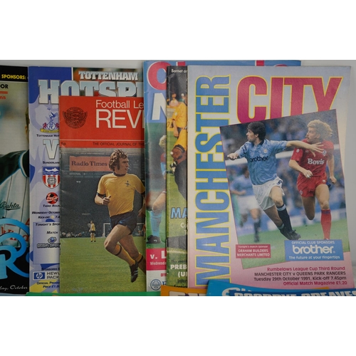 11 - A collection of various football programmes.