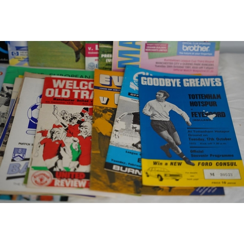 11 - A collection of various football programmes.