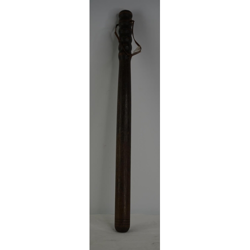 110 - A police wooden truncheon.