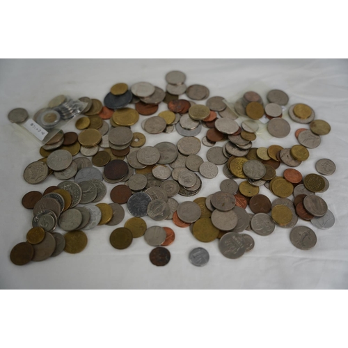 111 - An assorted lot of coinage, weighing approximately 1kg.