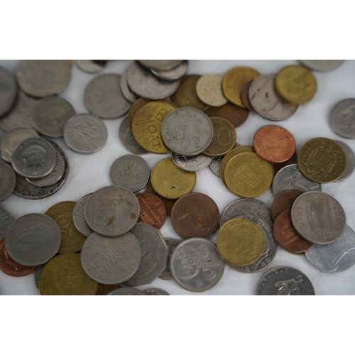 111 - An assorted lot of coinage, weighing approximately 1kg.