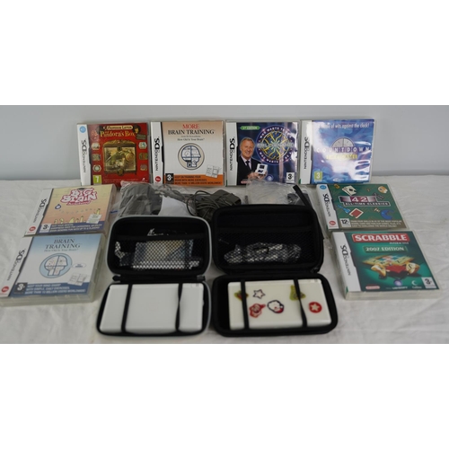 13 - Two Nintendo DS consoles and games etc.