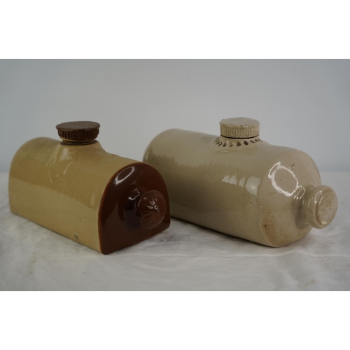 19 - Two stoneware hot water bottles.