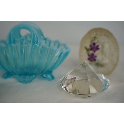 28 - A stunning vintage blue glass basket and four paperweights.