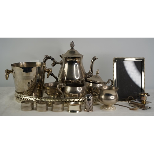 32 - An EPNS tea service and tray, a silver plated ice bucket and more.