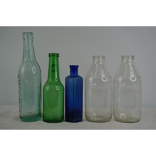 35 - Two vintage glass milk bottles, a P Murphy mineral water bottle and more.