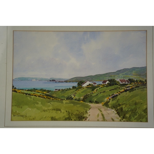 45 - A framed watercolour 'Whitepark Bay from Dunservick', signed David McCracken.45x55