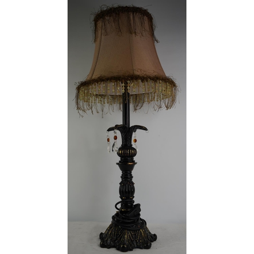 59 - A large metal and gilt table lamp and shade.