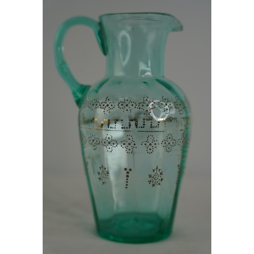 64 - A stunning antique uranium hand painted glass jug.