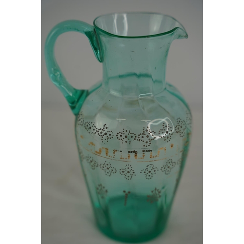 64 - A stunning antique uranium hand painted glass jug.