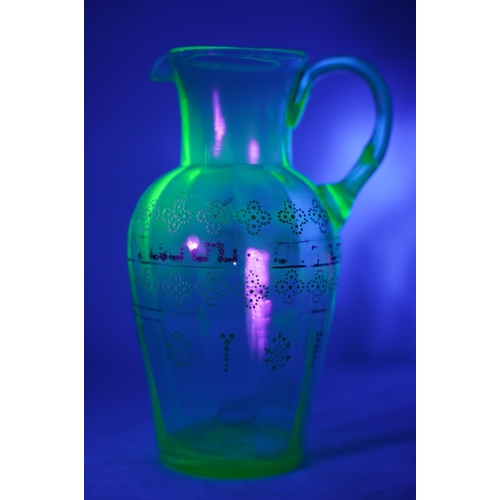 64 - A stunning antique uranium hand painted glass jug.