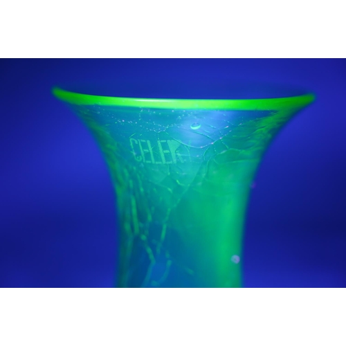 65 - A vintage uranium glass 'Celery' vase with crackled detail.