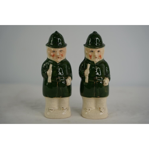 69 - A rare pair of Early 19th century Spice Pots modelled as Policemen.