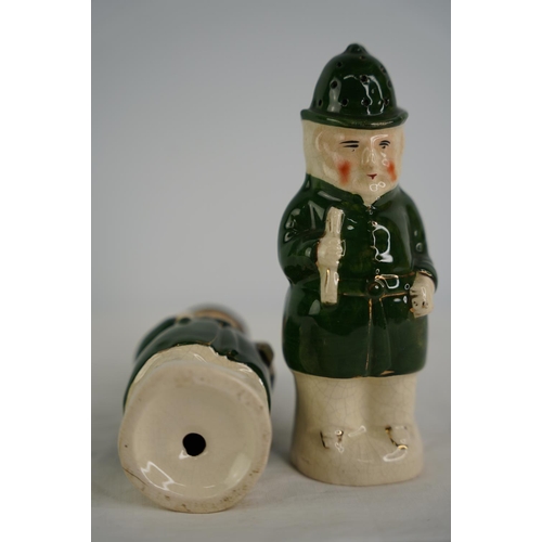 69 - A rare pair of Early 19th century Spice Pots modelled as Policemen.