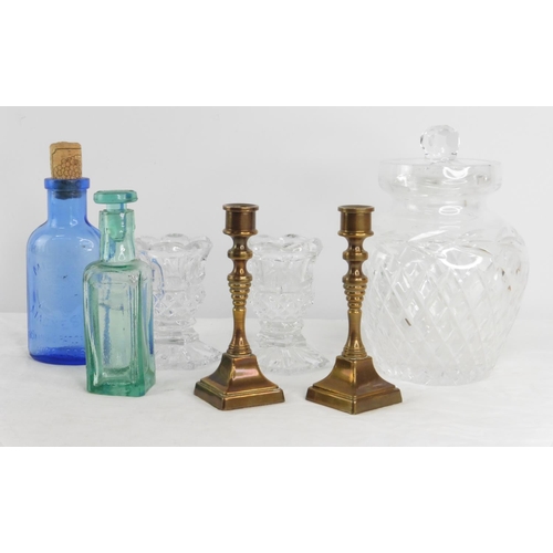 133 - A pair of small gilt metal and crystal candlesticks, collectors bottles and more.