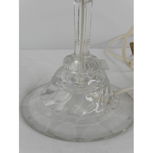 137 - A glass table lamp base.