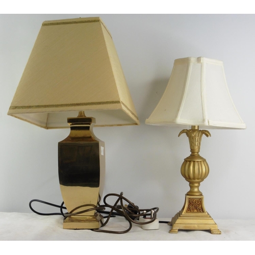 144 - A heavy brass table lamp and shade and another.