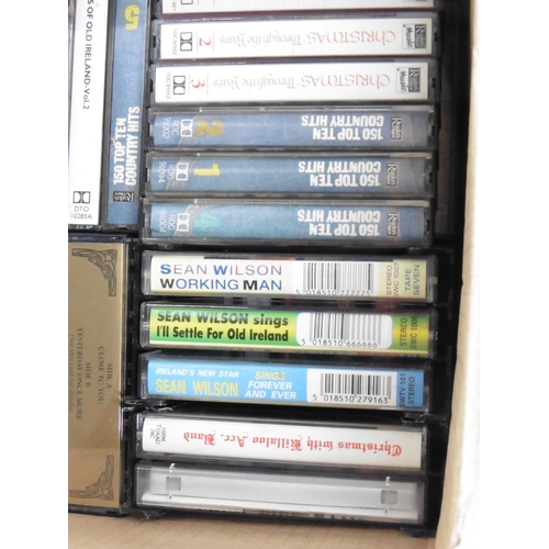 148 - An assortment of music cassette tapes.