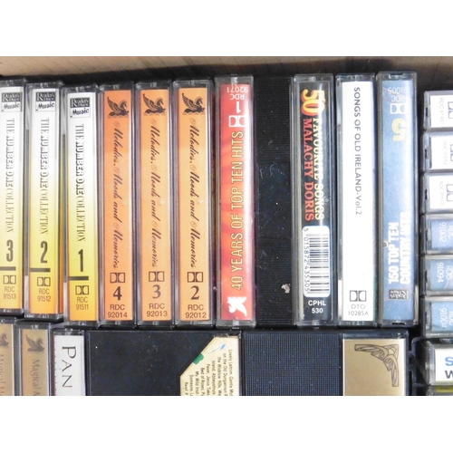 148 - An assortment of music cassette tapes.