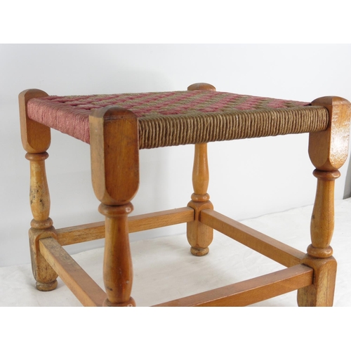 157 - A vintage rattan topped stool.