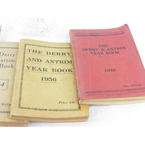 162 - Four Derry & Antrim Year Books - 1949, 1954, 1956 and another and a clear glass finger lamp.