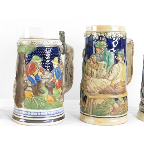 164 - Four German pottery style tankards.