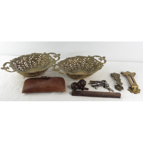 172 - A pair of antique brass dishes, two carved wooden drawer knobs, two gilt brass door knockers and mor... 