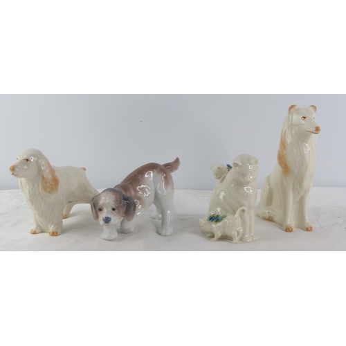 204 - A pair of Royal Doulton dog and cat figures and a Lladro dog.