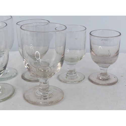 205 - A lot of nine antique rummer glasses.