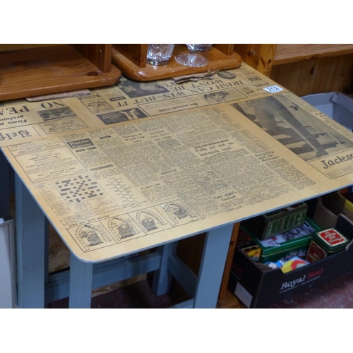 212 - A small upcycled dropleaf table with decoupage newspaper top.